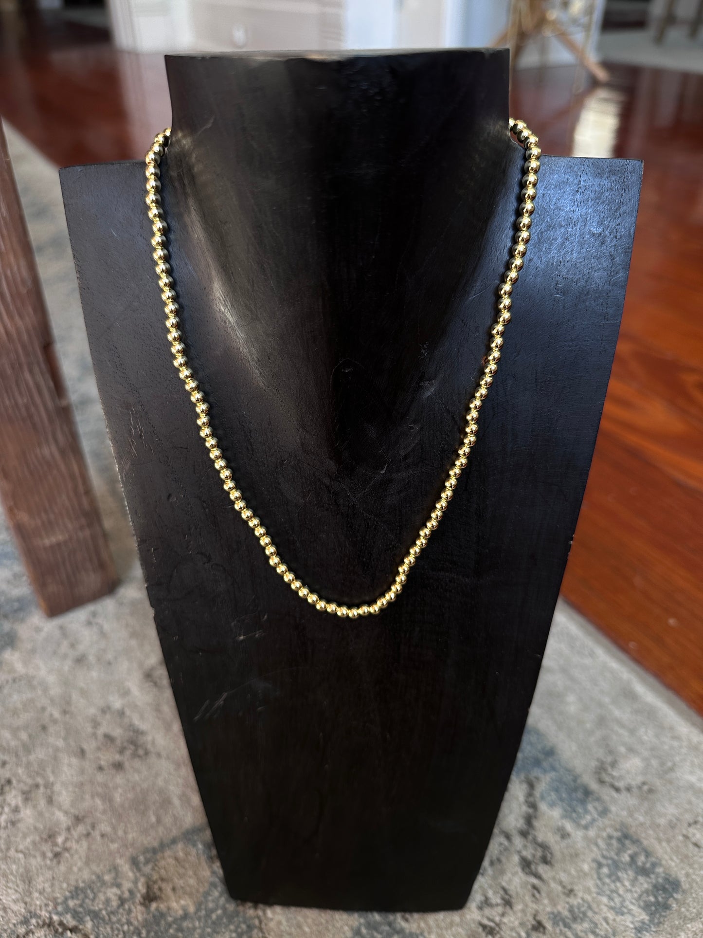 June gold bead necklace