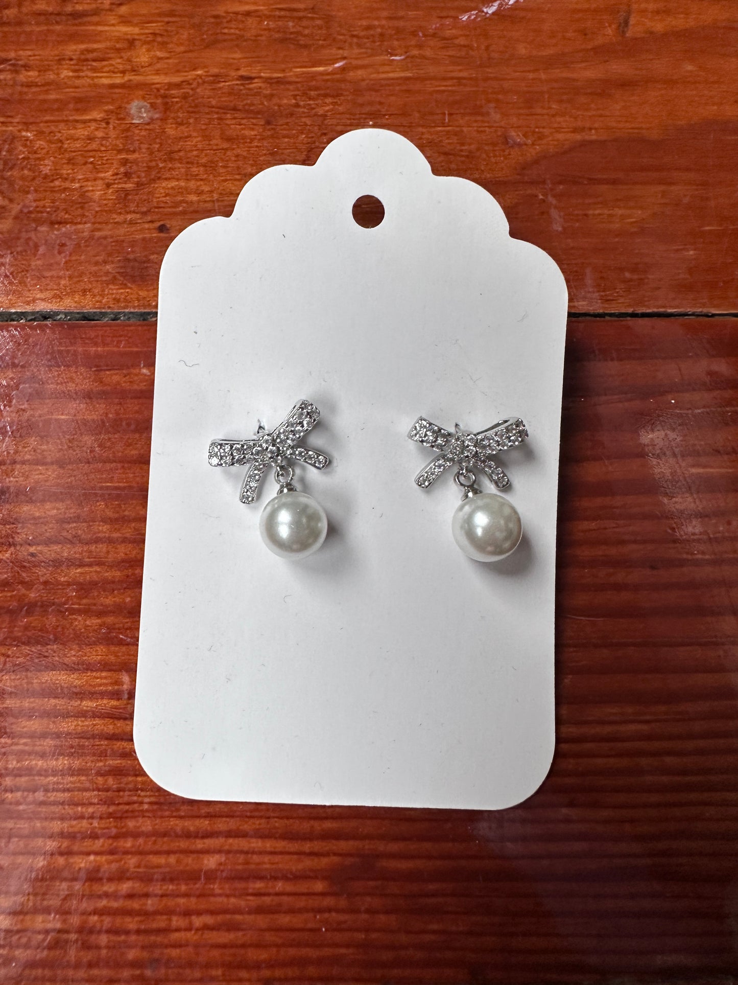 Silver bow shaped earrings