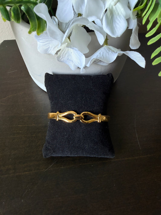 Gold double buckle bangle