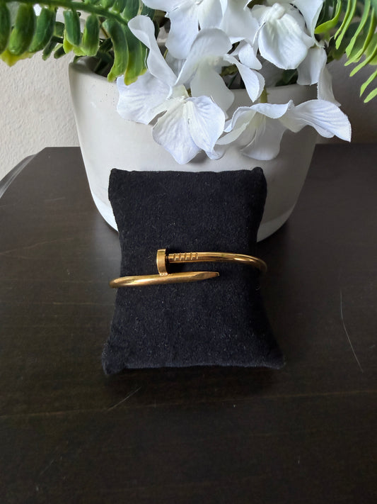Gold statement bangle