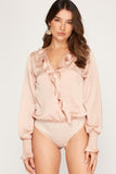 Champagne long sleeve ruffle body suit